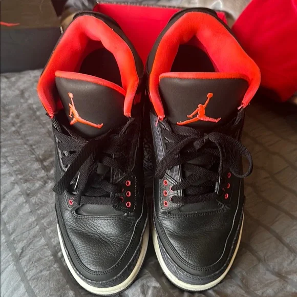 Jordan Black Athletic Shoes with Red Highlights Amazon.com | Air Jordan 1 Mid Men main image 3